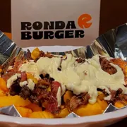 Porções: Batata Costela Philadelphia 250g - Batata que você já conhece, suuuper crocante, com cream cheese Philadelphia e Costela defumada Angus! Simplesmente Irresistível!
