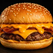 Picanha Pika: Pikanha Stark Cheddar Melt - Picanha Pika (Ingredientes: Bacon 2 Fatias, Hamburguer de picanha 120g, Molho cheddar Melt, Pão Com Gergelim, Queijo Cheddar Polenghi 2 fatias)