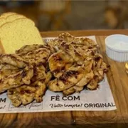 Porção: Tiras de Frango Grelhado na Manteiga de Coco - Porção (Ingredientes: )