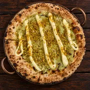 Doces: 56 - Pistacchio - Pizza Grande (8 Fatias 35cm) (Ingredientes: Chocolate Branco Forneável, Creme de pistache)