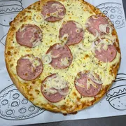 Tradicionais: Lombo Canadense - Pizza Grande (Ingredientes: Cebola, Lombo Canadense, Molho, Mussarela, Orégano)