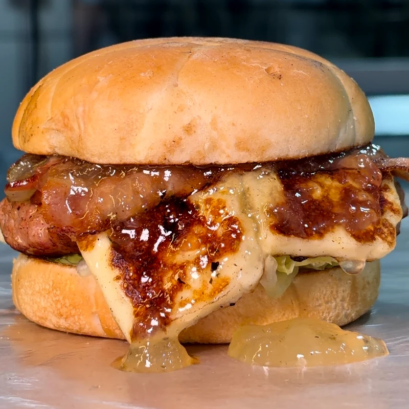 Hambúrguer: 19 - Tropical Burguer - Hambúrguer (Ingredientes: Alface americana, Bacon, Geléia de Abacaxi, Hambúrguer de Linguiça Suína de 120gr, Maionese, Pão Brioche Bola, Queijo Coalho)