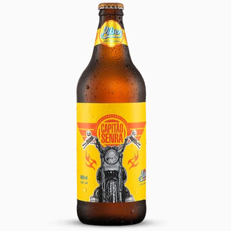 Cerveja: Cerveja Capitão Senra Pilsen - 600ml - A Capitão Senra Pilsen traz o equilíbrio perfeito entre a leveza e a personalidade de uma autêntica artesanal mineira. Com uma belíssima cor dourada e espuma cremosa, apresenta um aroma sutil de malte com toques delicados de mel e cereais. Seu amargor é muito suave e equilibrado, oferecendo uma refrescância ideal que limpa o paladar a cada gole. Dica da casa: Combina perfeitamente com pizzas de embutidos (como Calabresa e Pepperoni) ou queijos semiduros (como as que levam Provolone ou Gouda)
